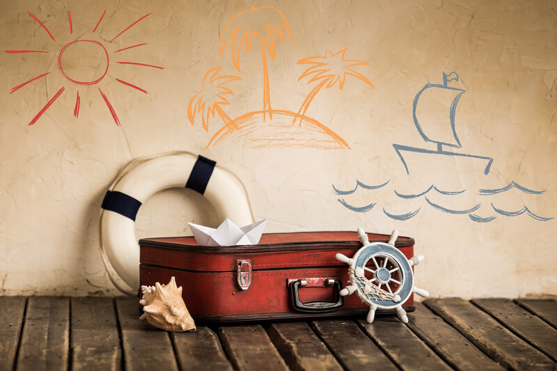Red Suitcase with Nautical Items