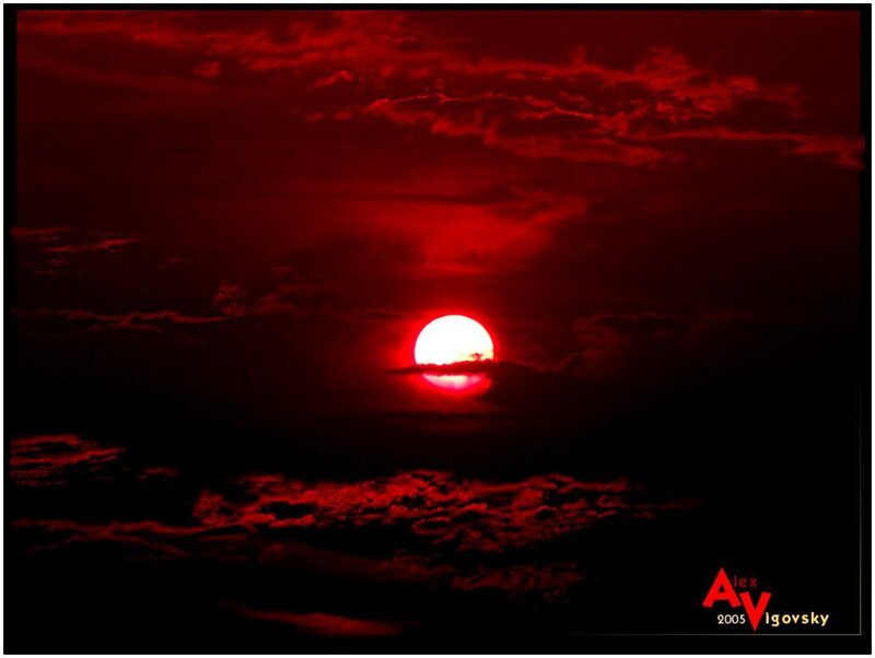 Red Sun Over Clouds