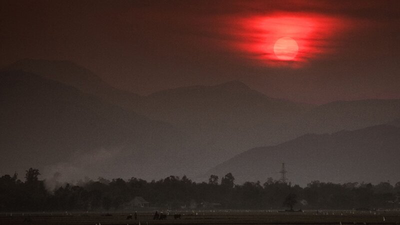 Red Sun over Mountains — Dramatic, Sunset, Photograph