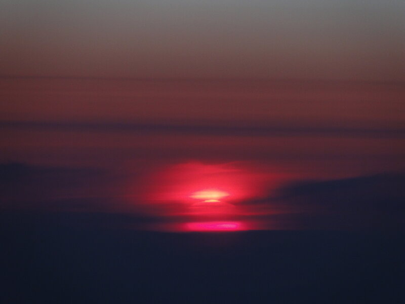 Red Sun Setting — Dramatic, Sunset