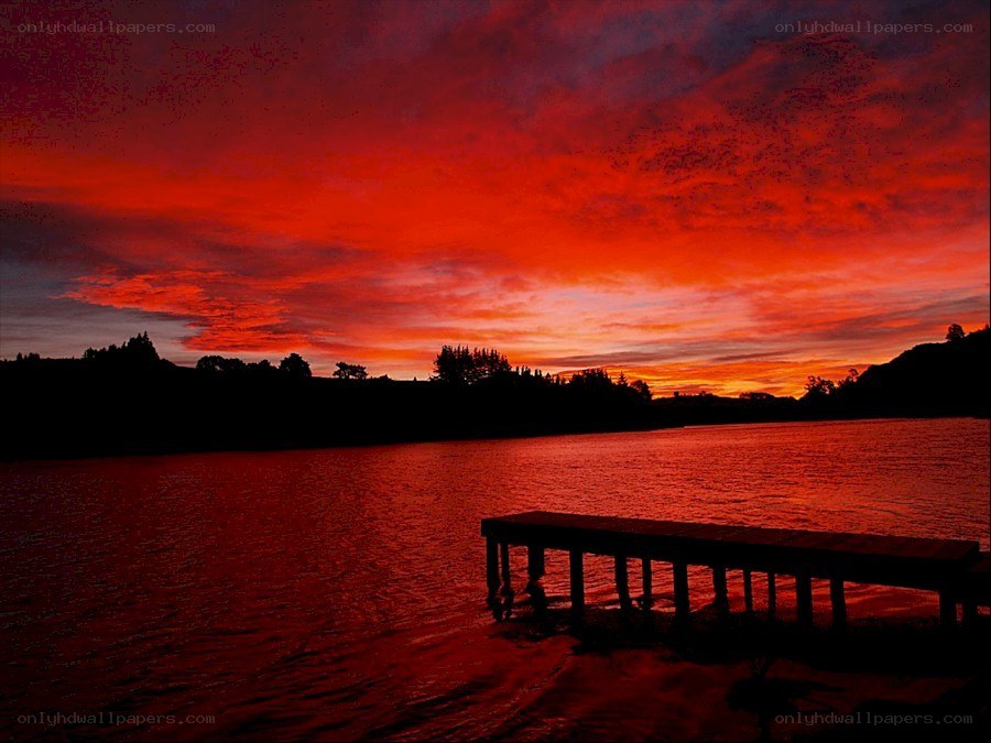 Red sunset over a lake