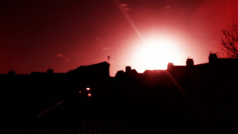 Red sunset over rooftops