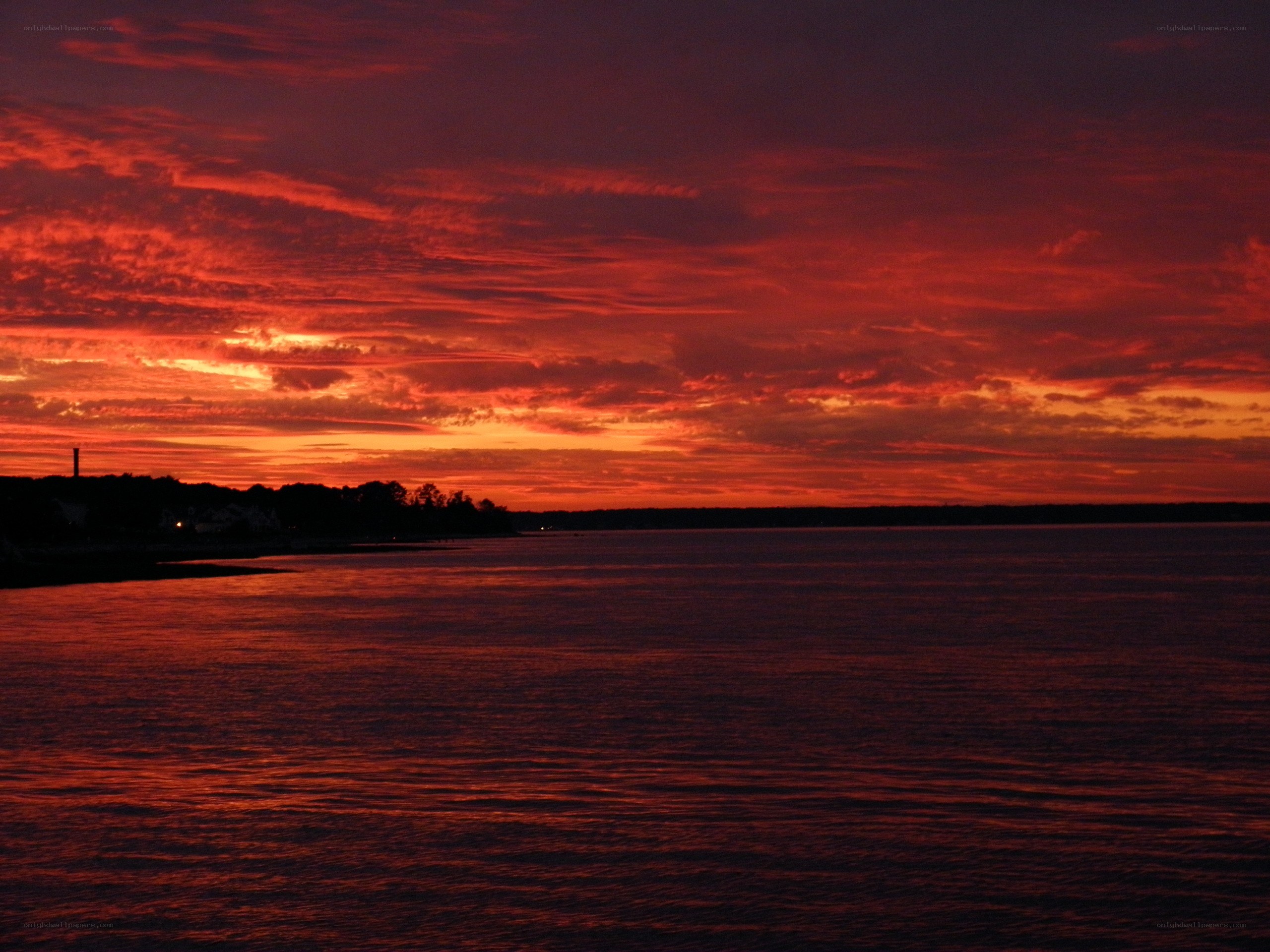 Red sunset over the water