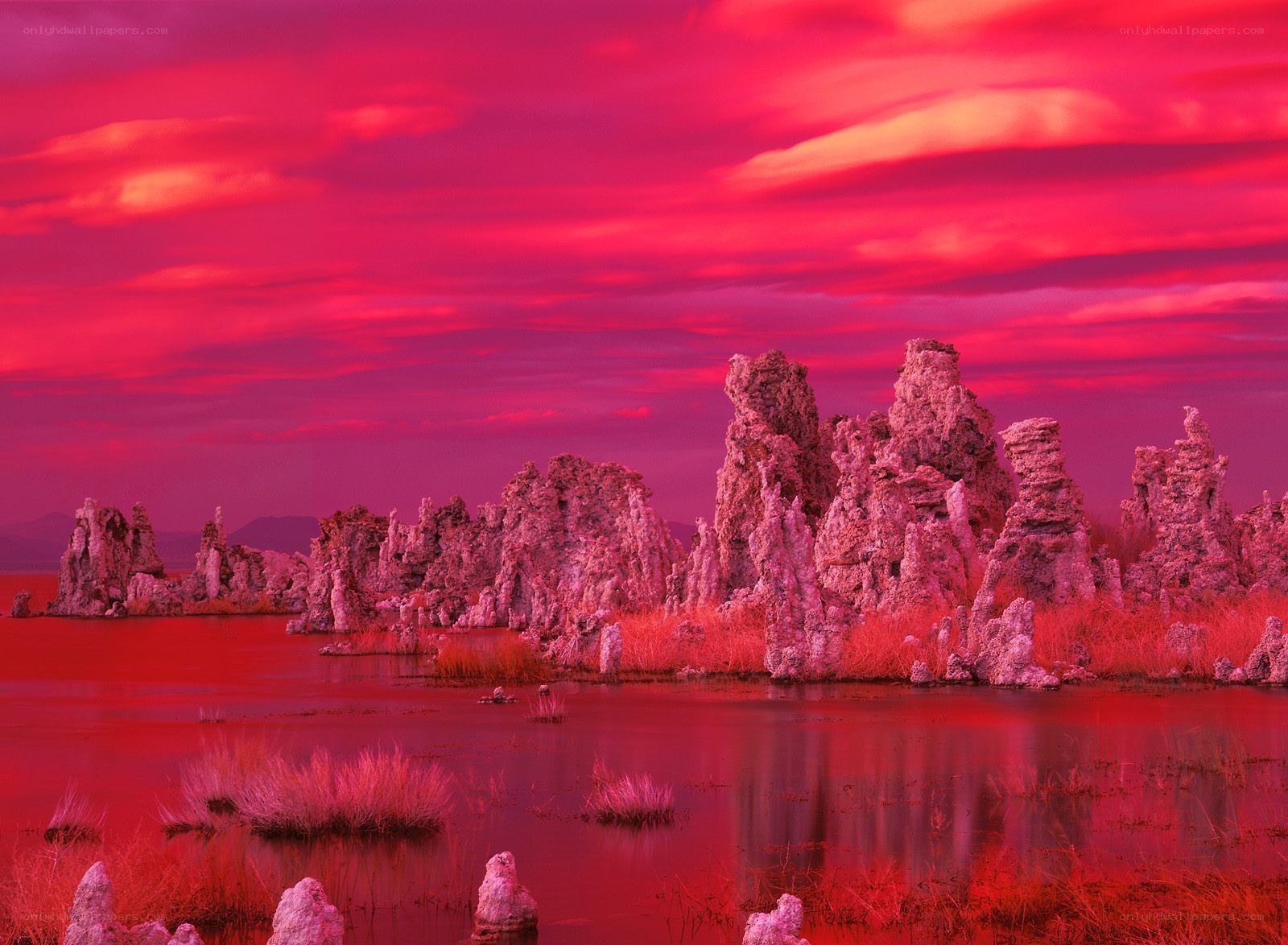 Red sunset over tufa formations