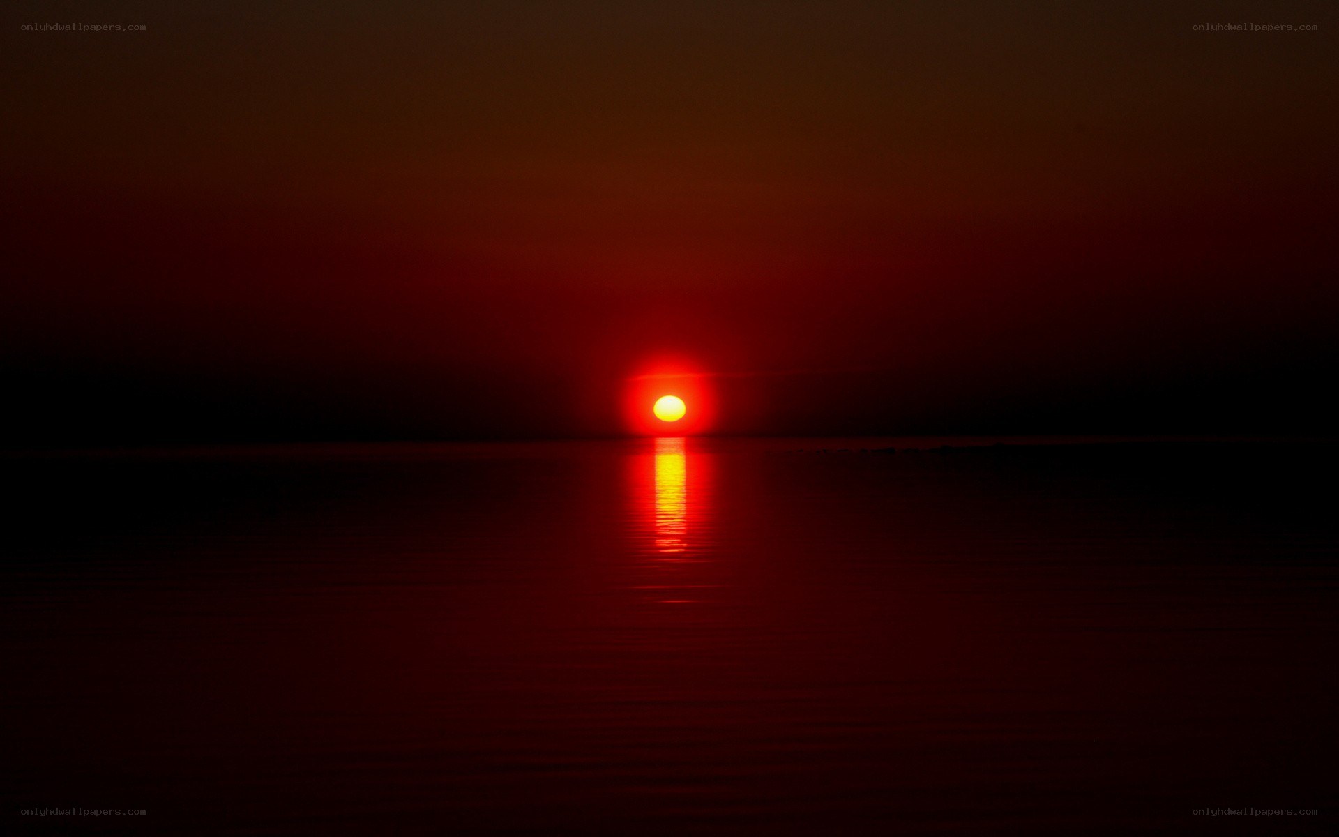 Red sunset over water