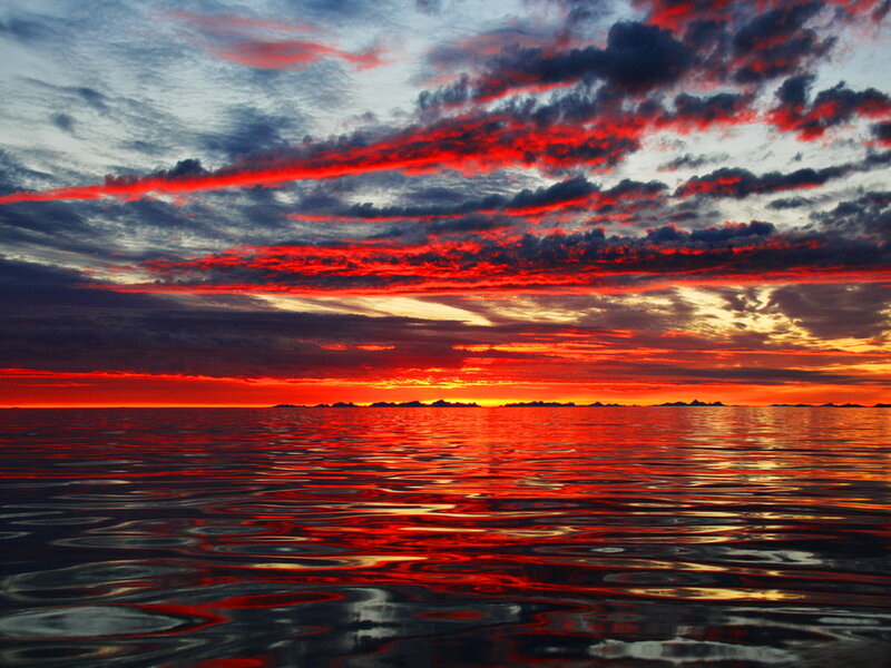 Red Sunset over Water — Dramatic, Photograph, Clouds