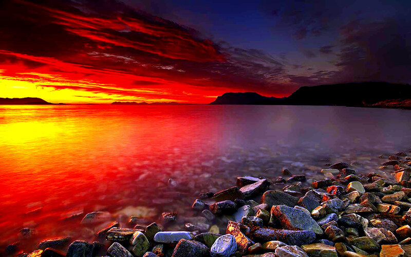 Red Sunset over Water — Dramatic, Photograph, Rocks