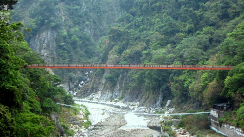 Red Suspension Bridge — Green, Serene