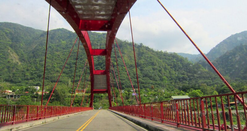 Red Suspension Bridge — Serene