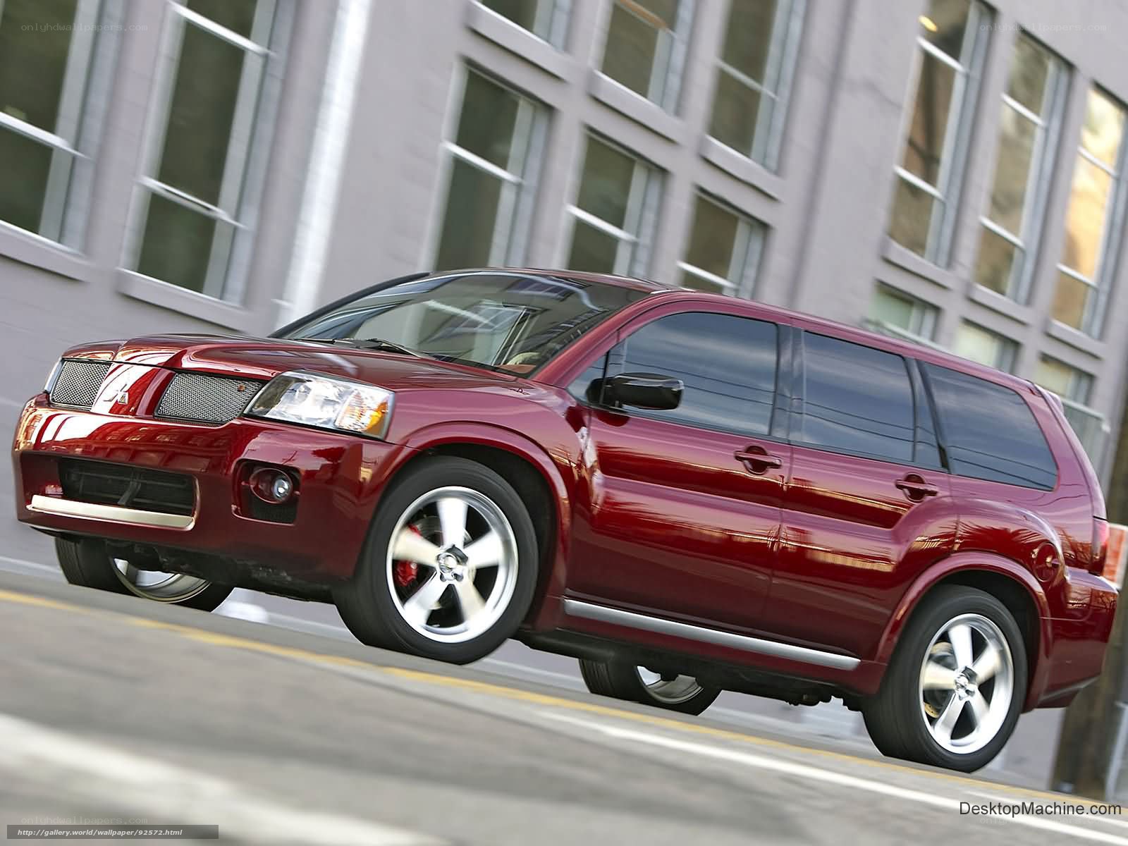 Red SUV in city motion