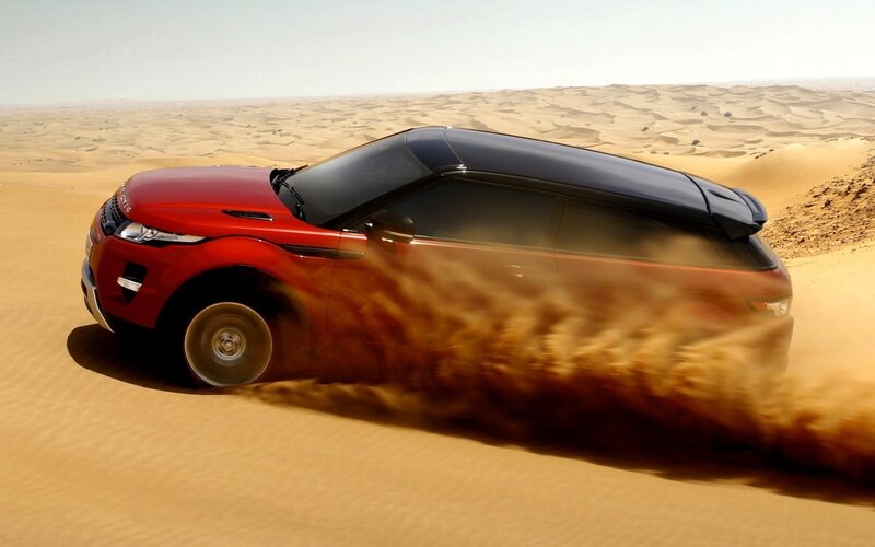 Red SUV in Desert