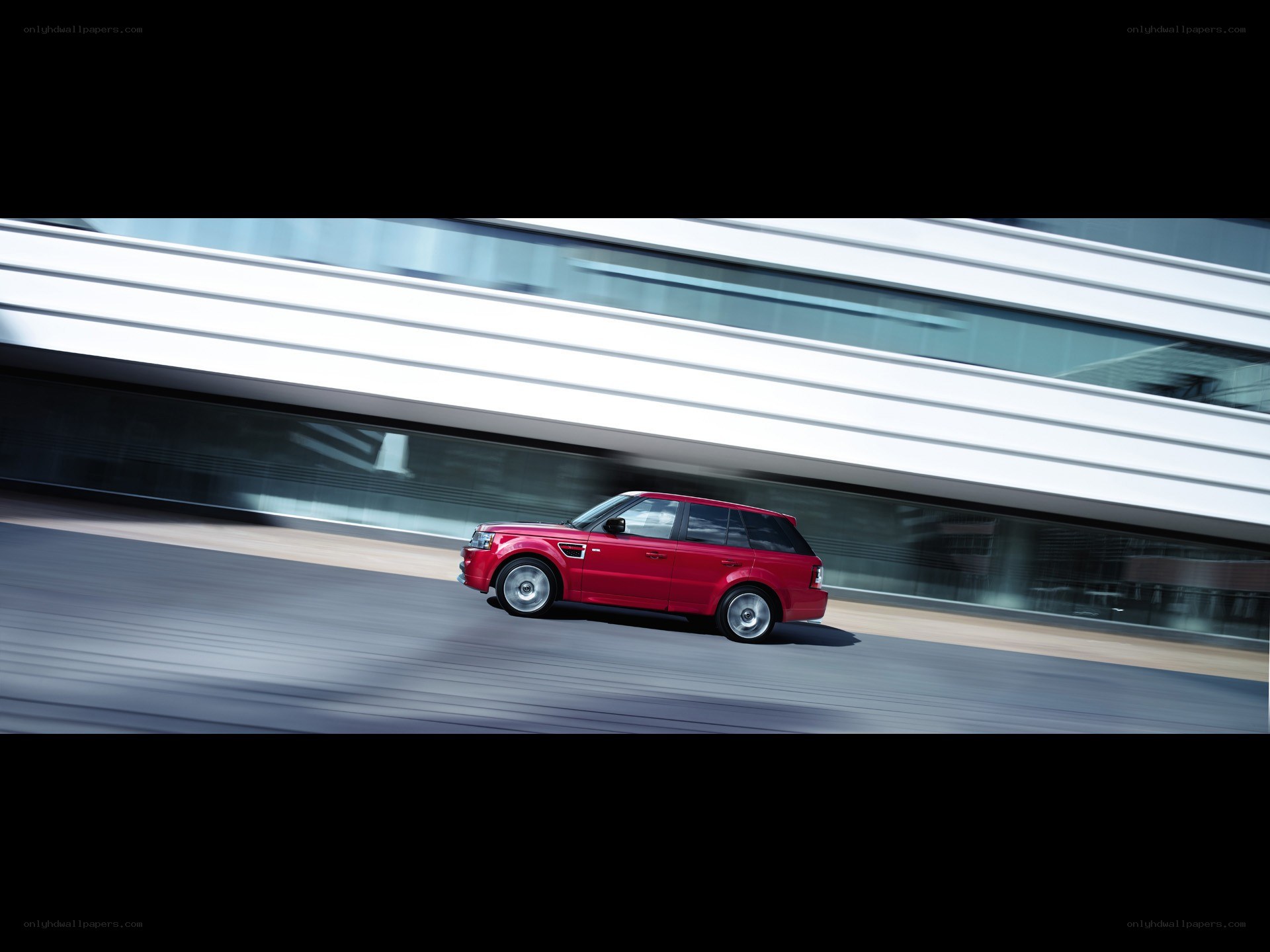 Red SUV in motion