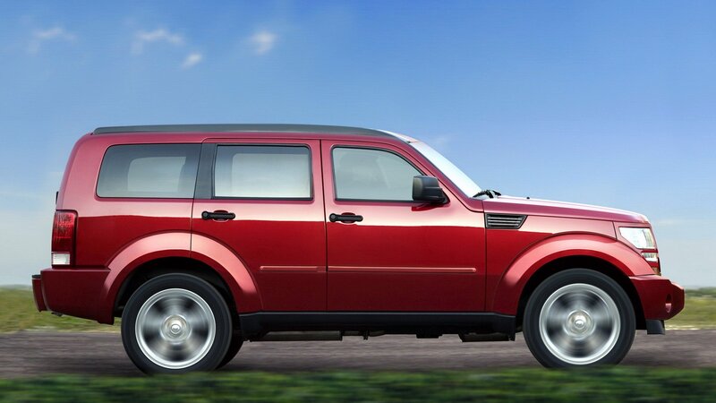 red suv in motion