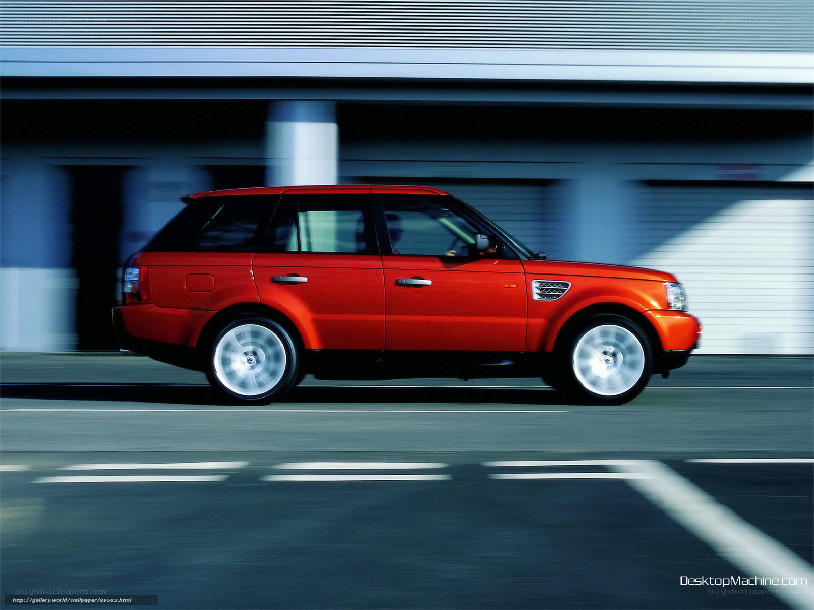 Red SUV in motion
