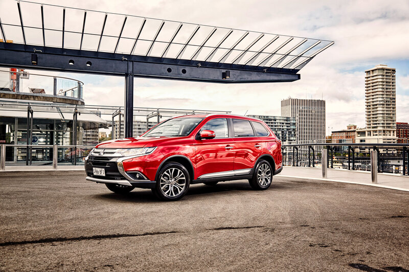 Red SUV in urban setting
