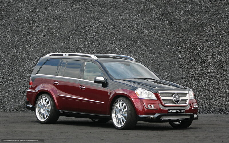 red suv on gravel