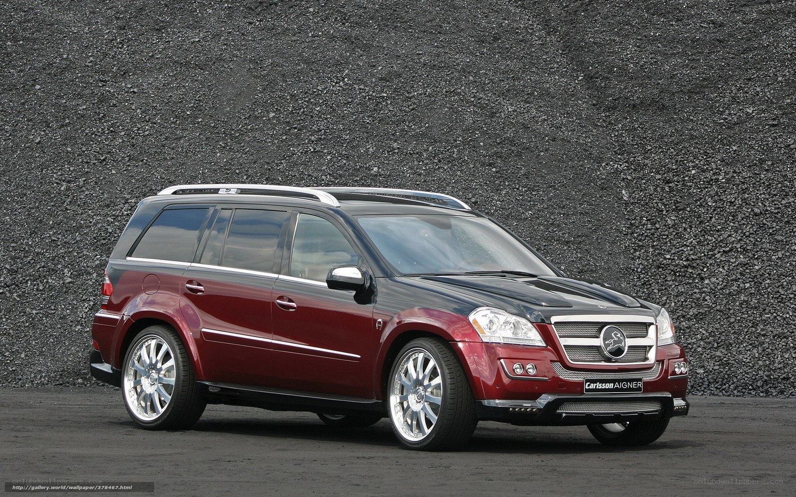 red suv on gravel