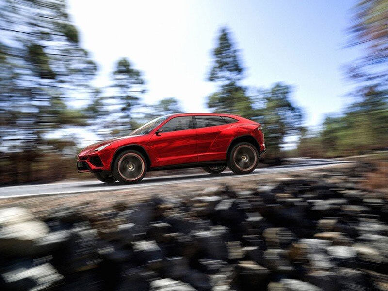 Red Suv on Road — Dynamic, Afternoon, Photograph