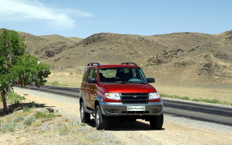 Red Suv on Road — Outdoor