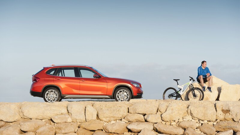 Red Suv on Rocks
