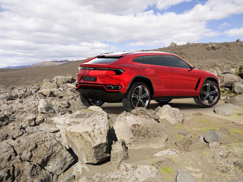 Red Suv on Rocky Terrain — Dramatic, Afternoon, Photograph