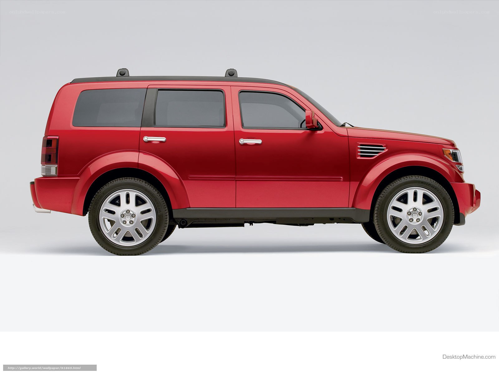 Red SUV side profile