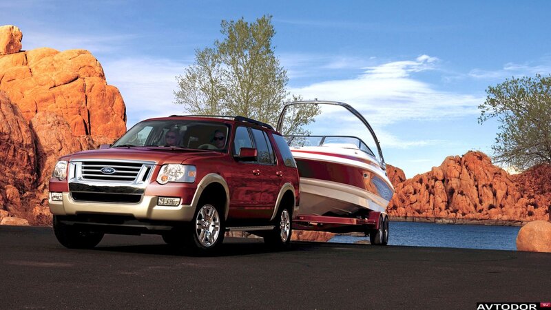 Red Suv Towing Boat
