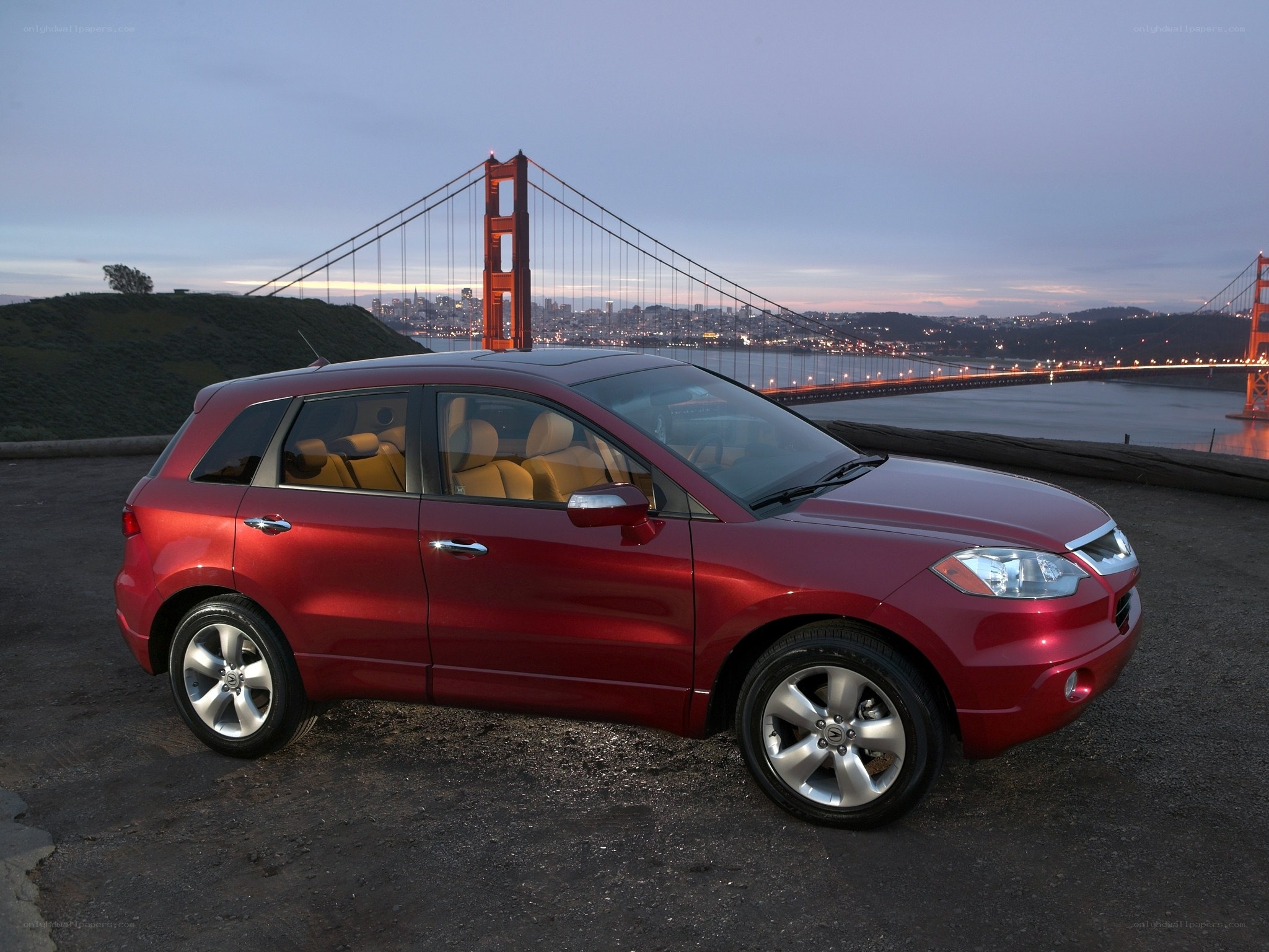 Red SUV with Golden Gate Bridge