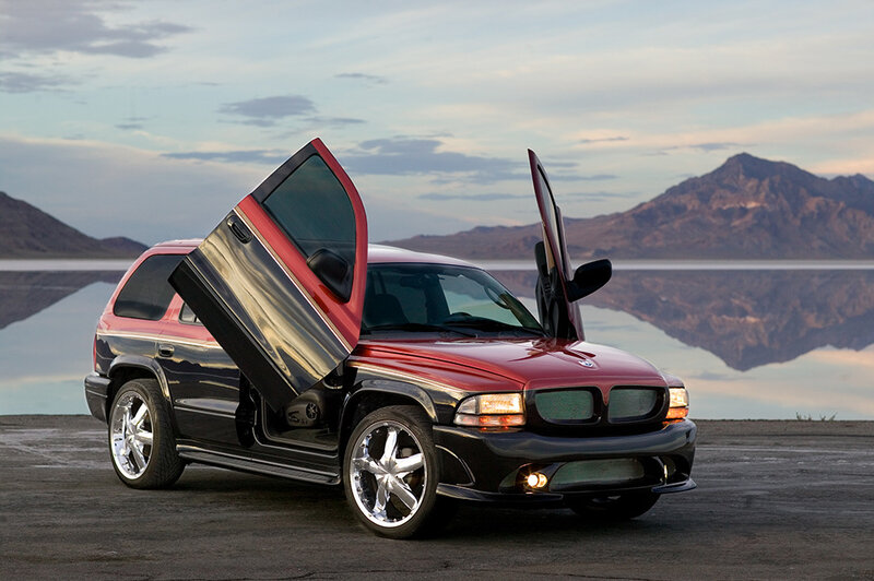 Red SUV with gullwing doors
