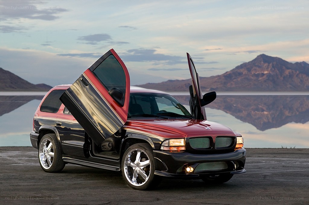 Red SUV with gullwing doors