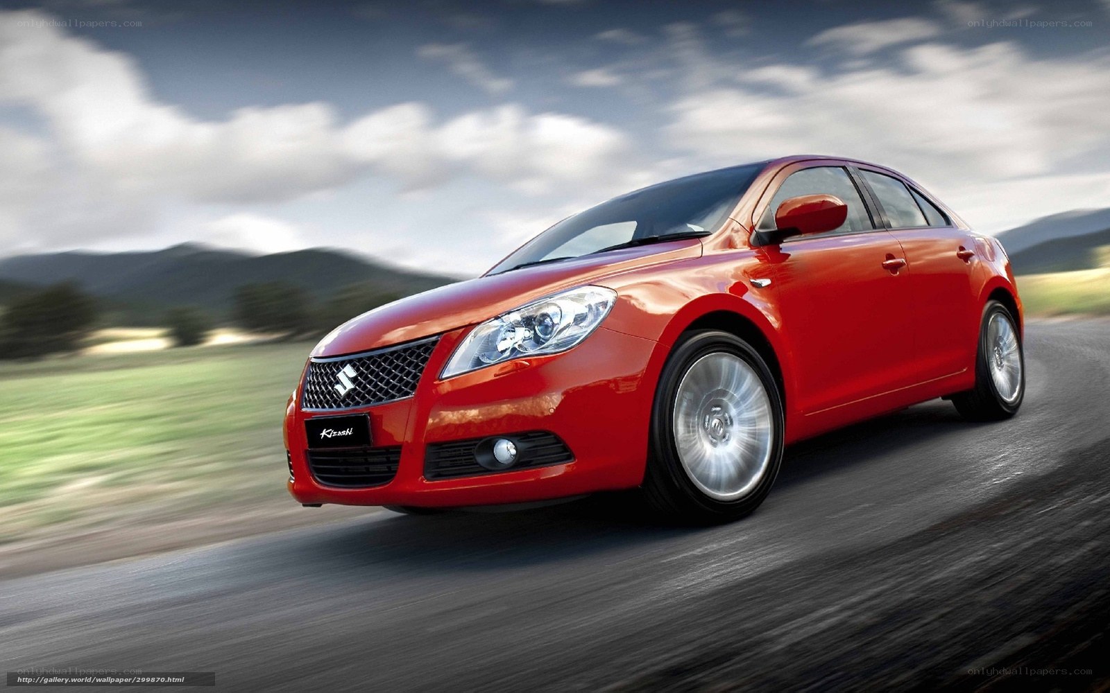 Red Suzuki Kizashi in motion