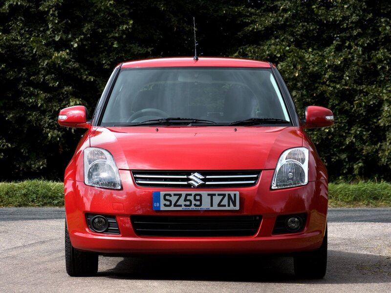 red suzuki swift car