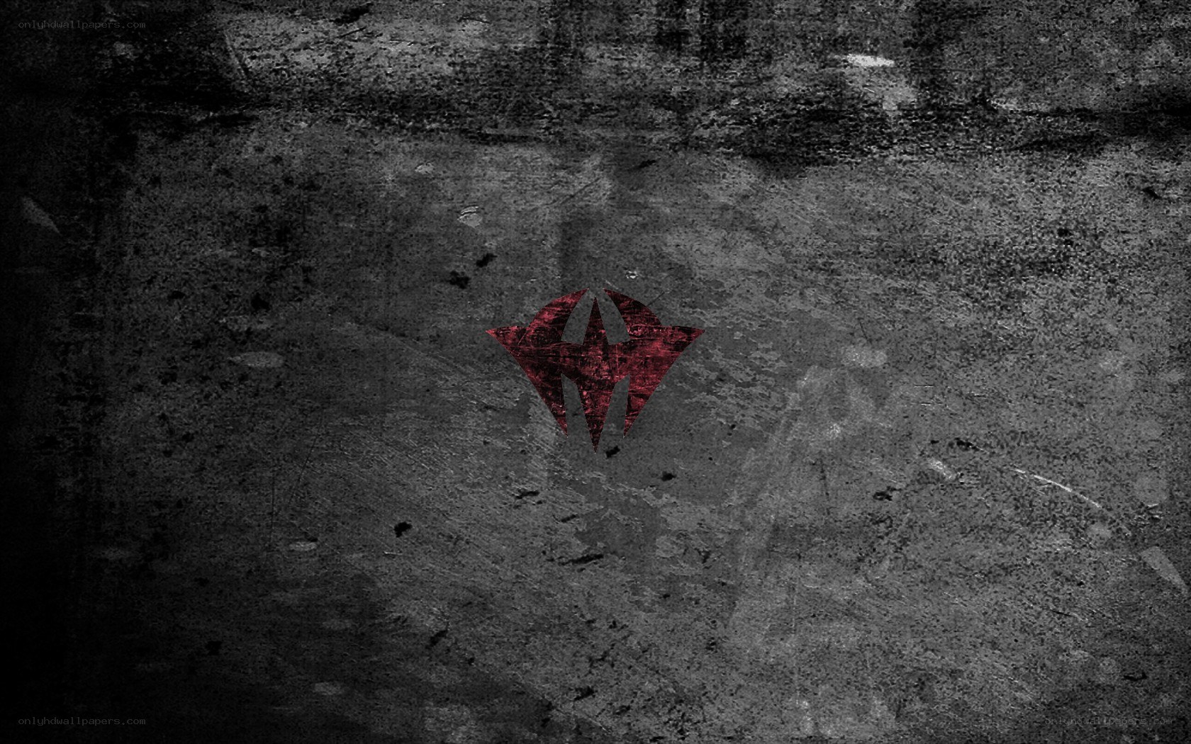 red symbol on concrete wall
