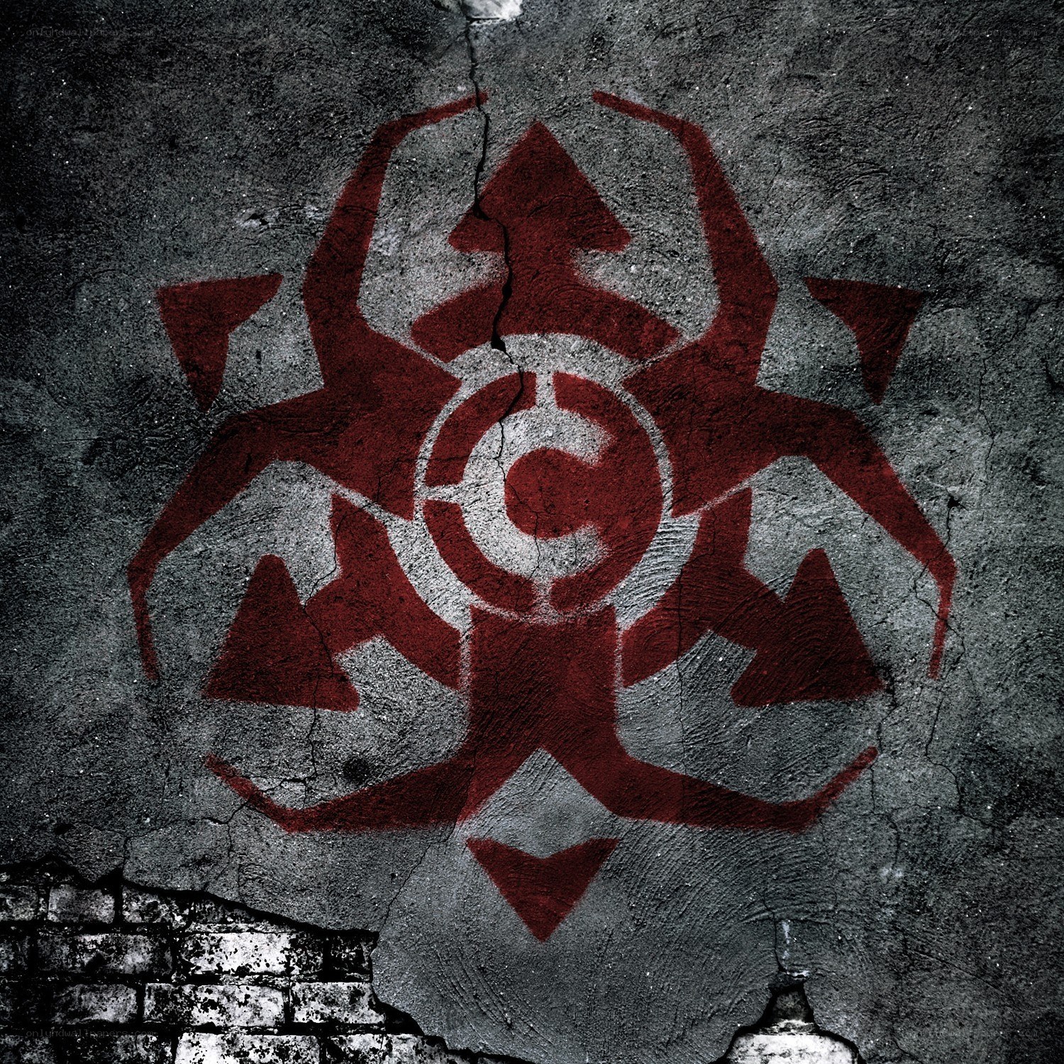 red symbol on cracked wall