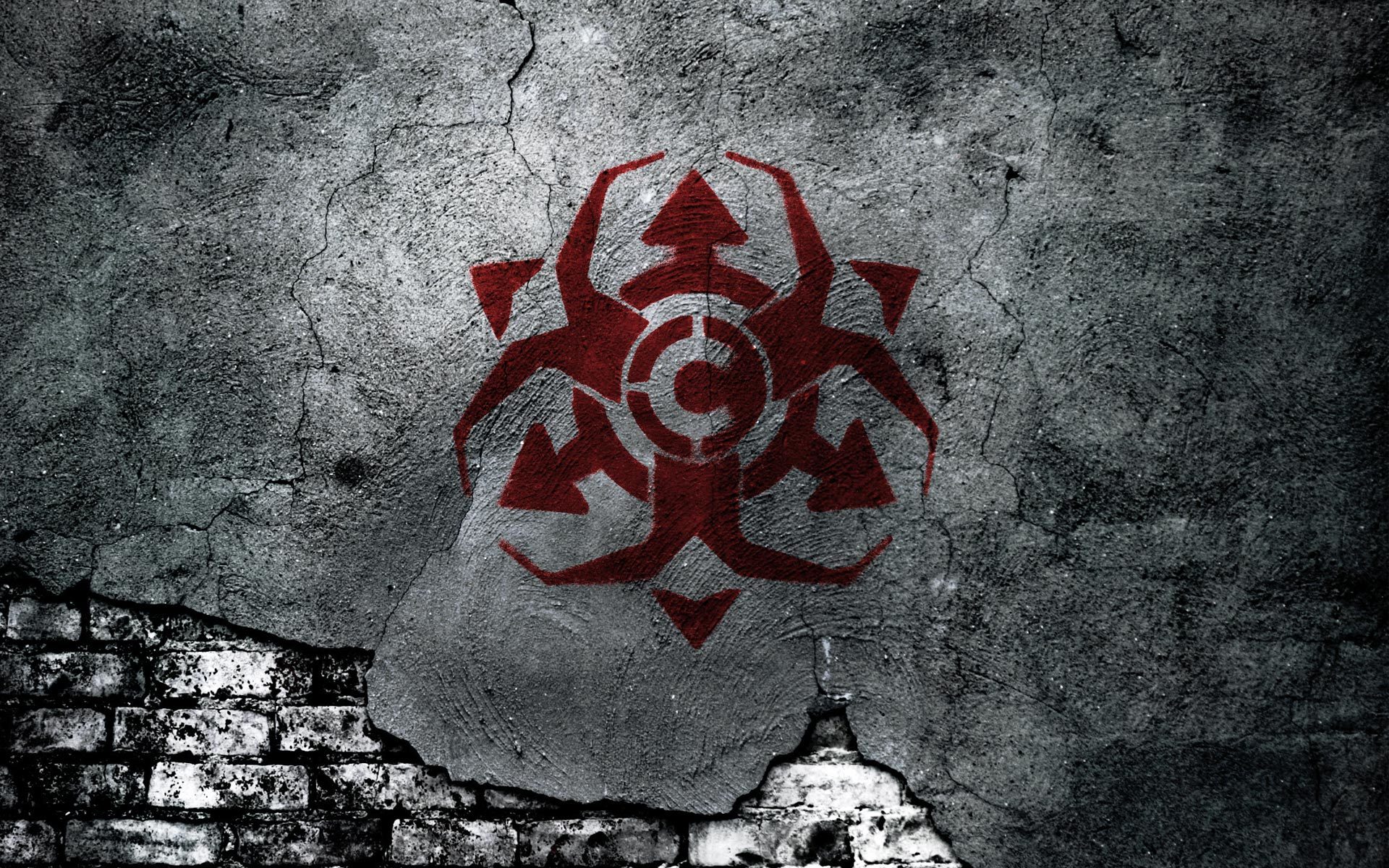 red symbol on cracked wall