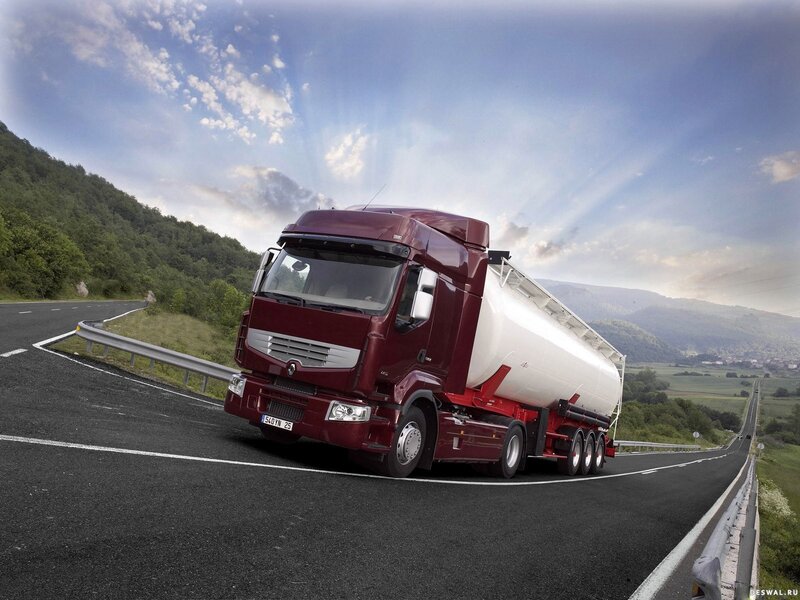 Red tanker truck on winding road