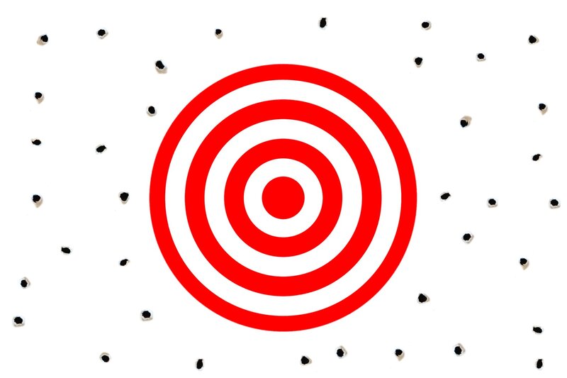 Red Target with Bullet Holes