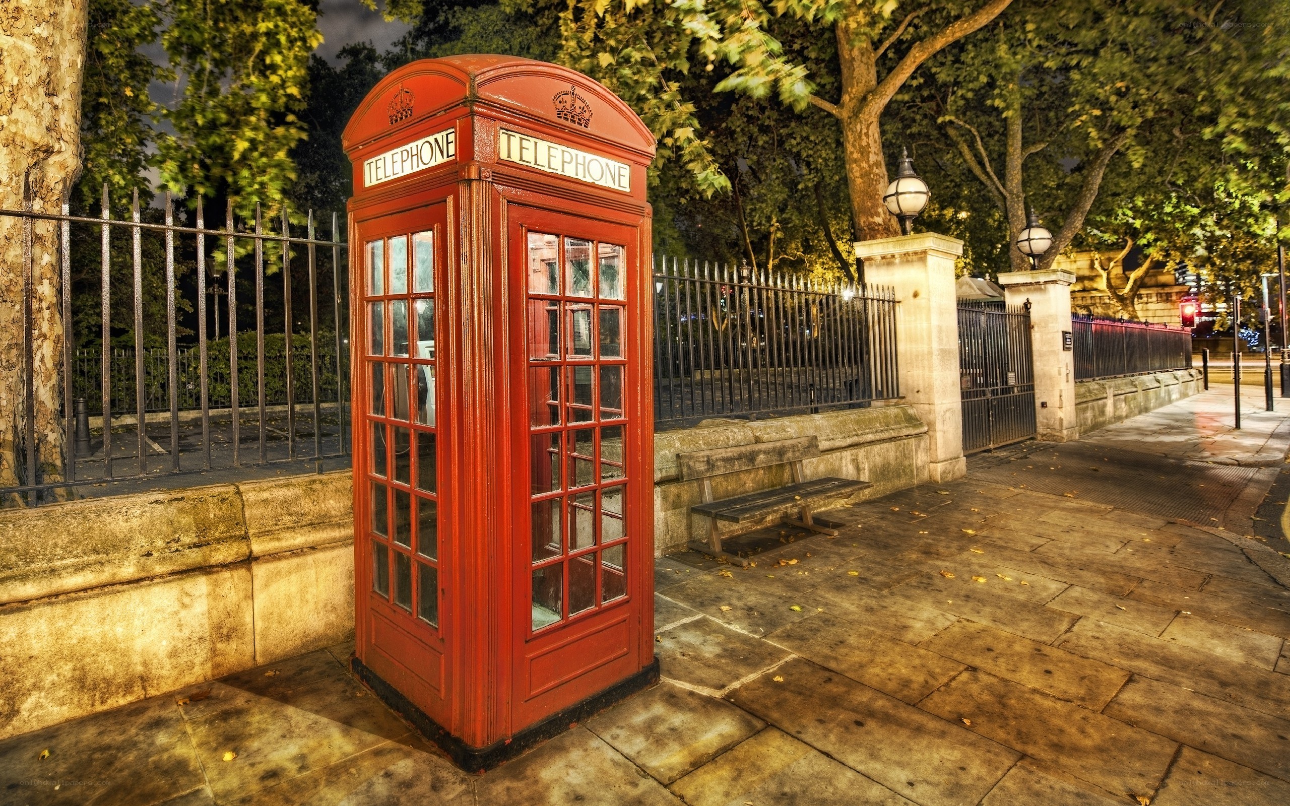 Red telephone box at night