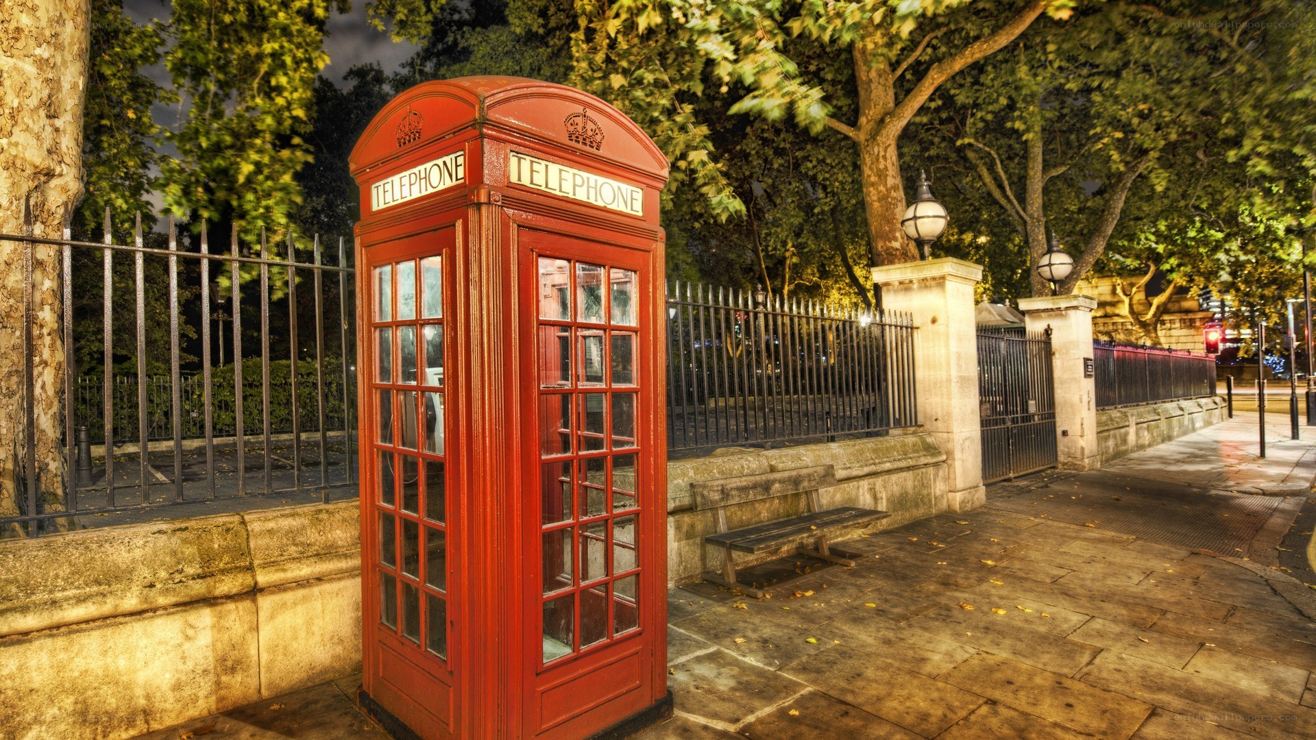 Red telephone box at night