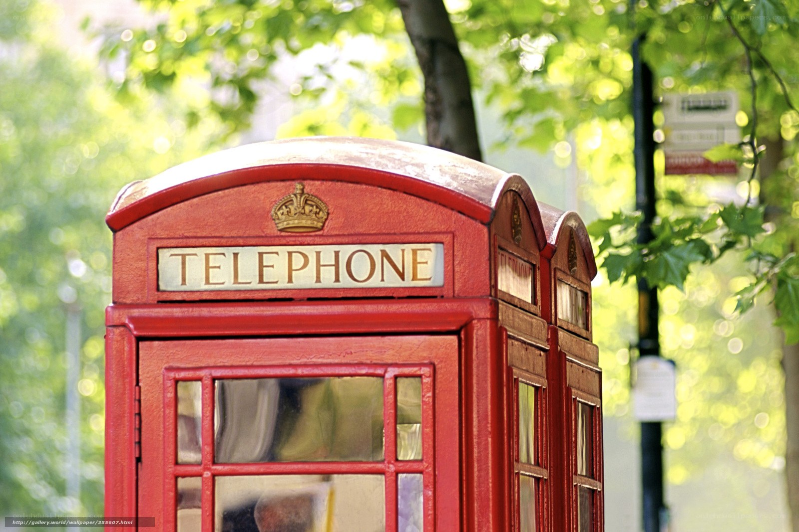 Red telephone box in park