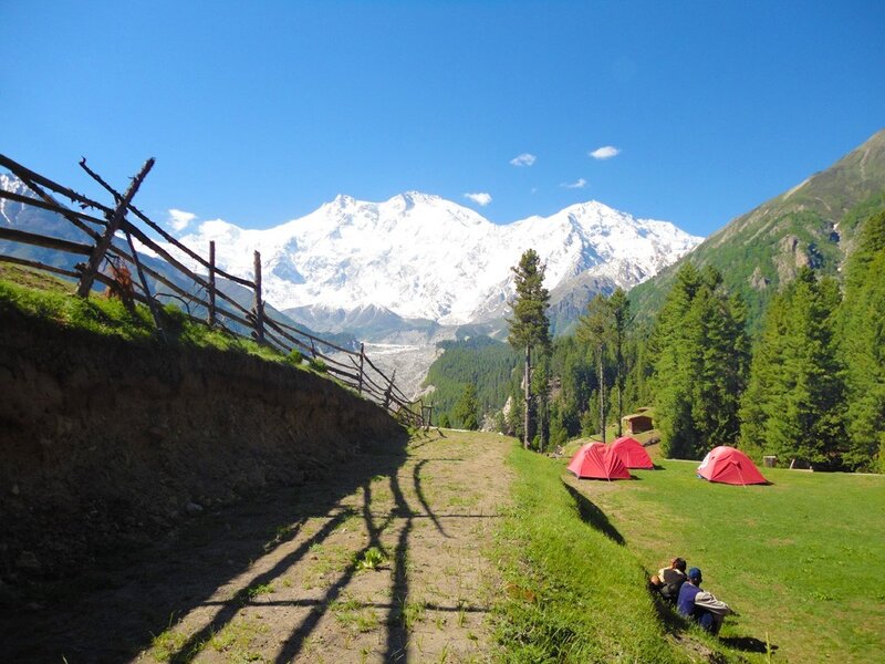 Red Tents in Mountain Valley