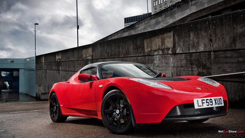 Red Tesla Roadster — Dramatic, Photograph, Car, Concrete Wall