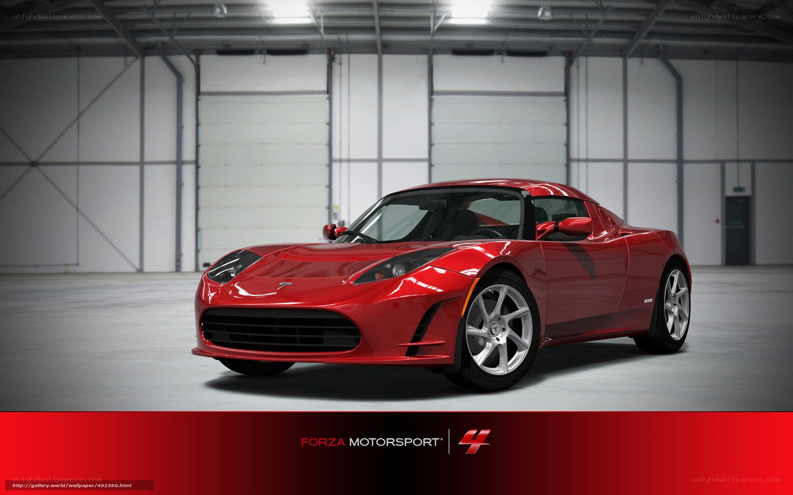 Red Tesla Roadster in garage