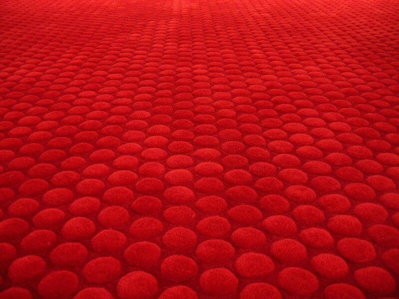 red textured carpet pattern