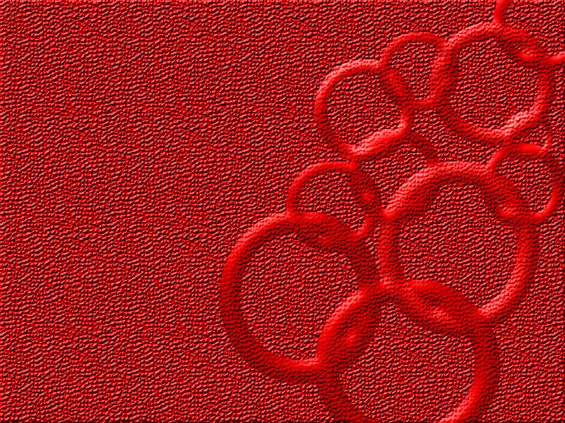 red textured surface with circles