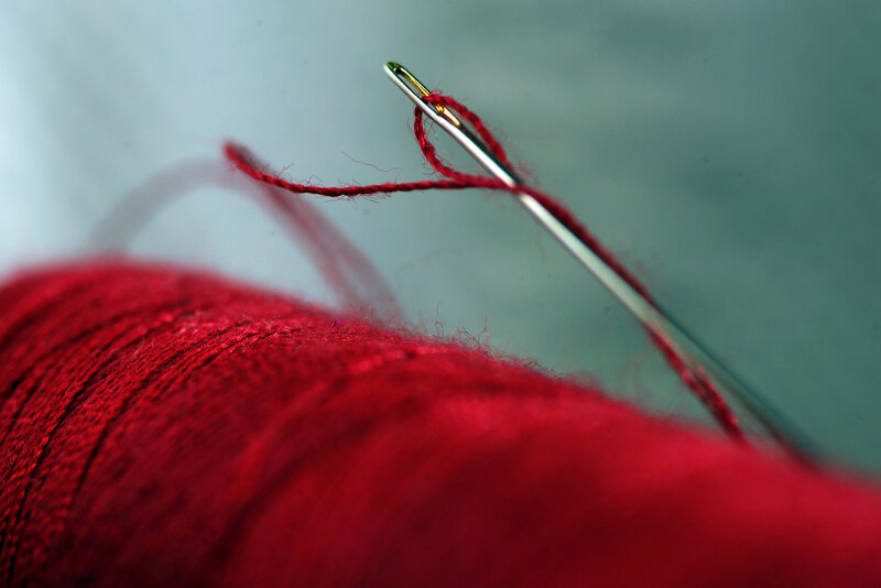 Red Thread on Needle