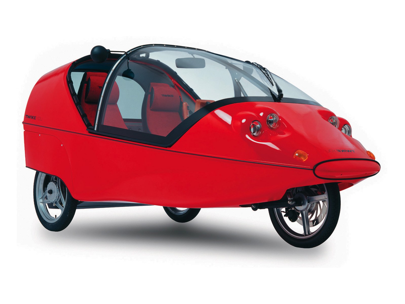 Red three-wheeled electric car