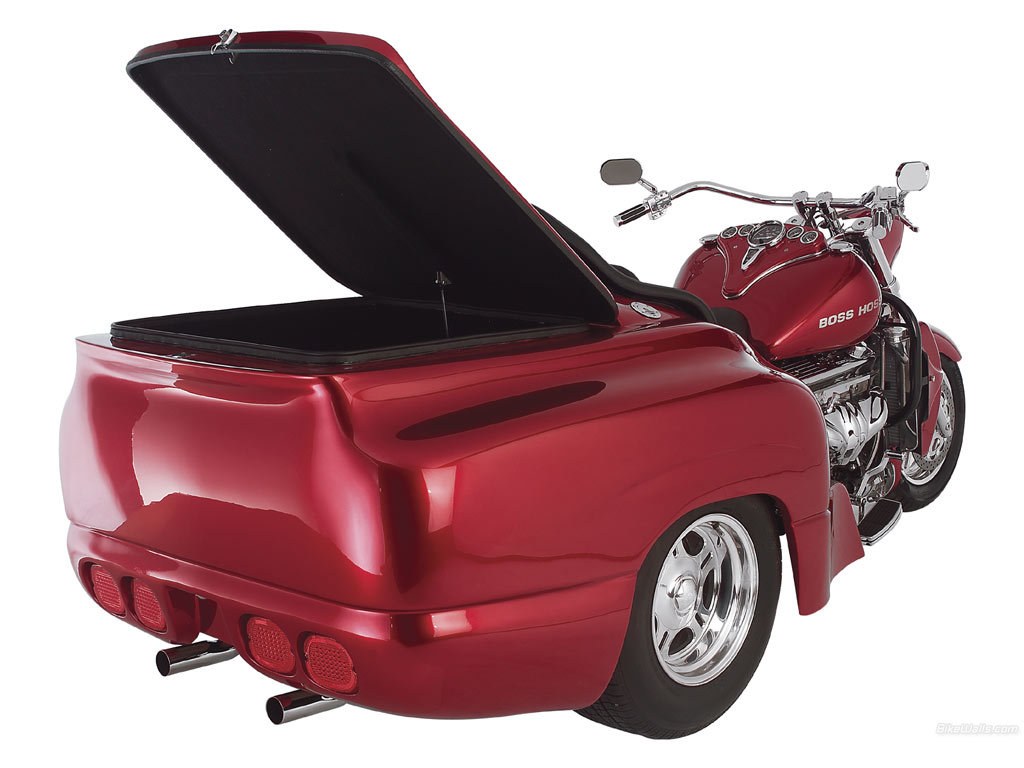 Red three-wheeled motorcycle with storage