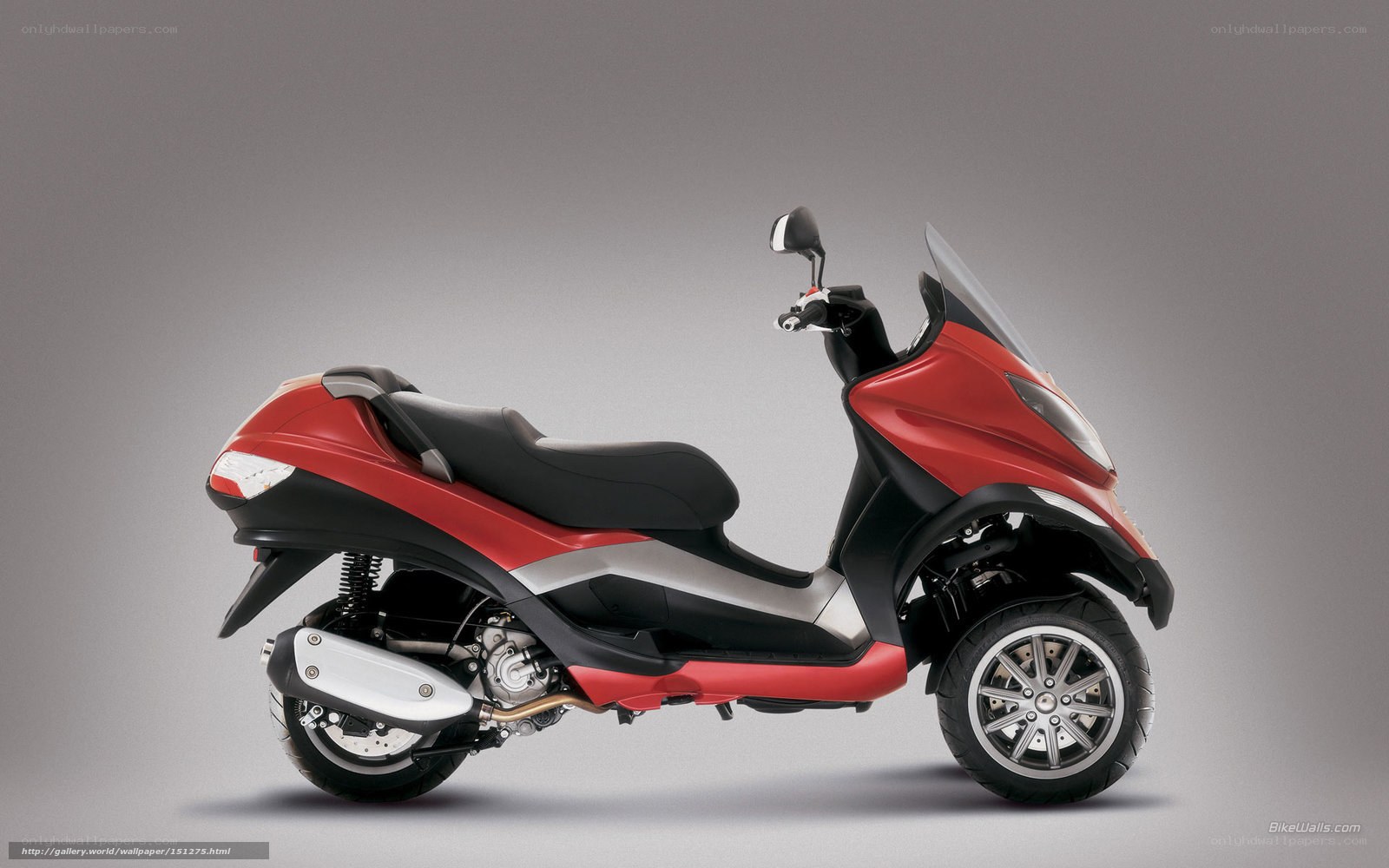 red three-wheeled scooter