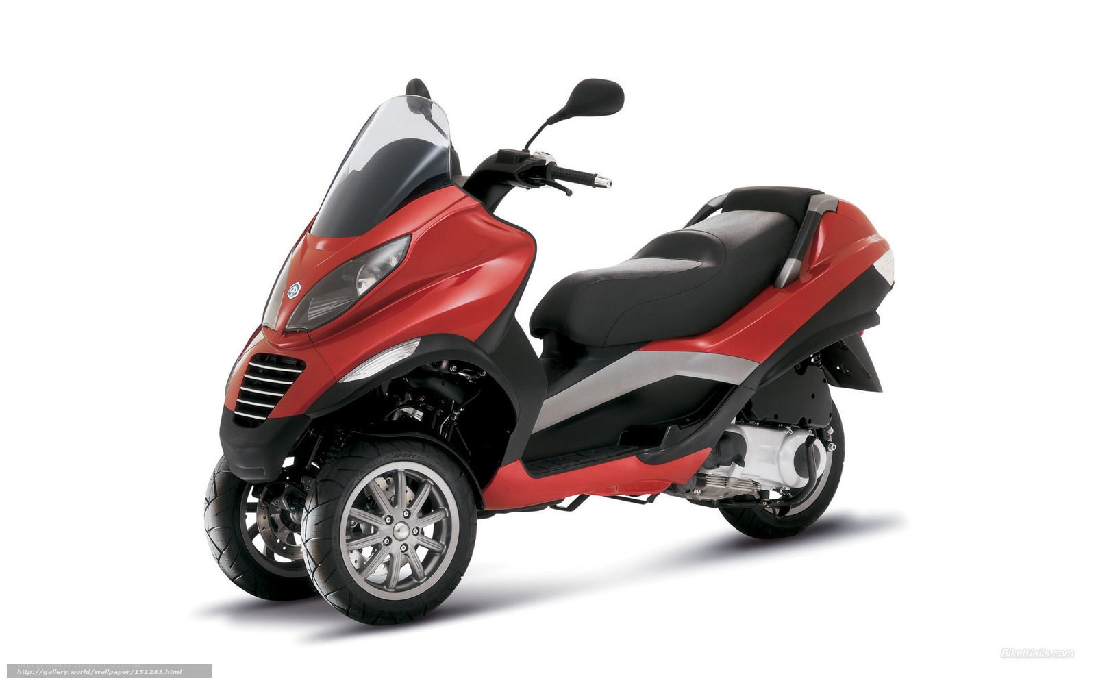 red three-wheeled scooter